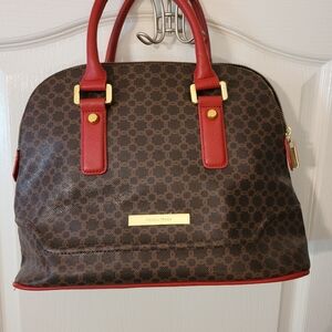 Ivanka Trump Ava dome bag. Brown with red accents.